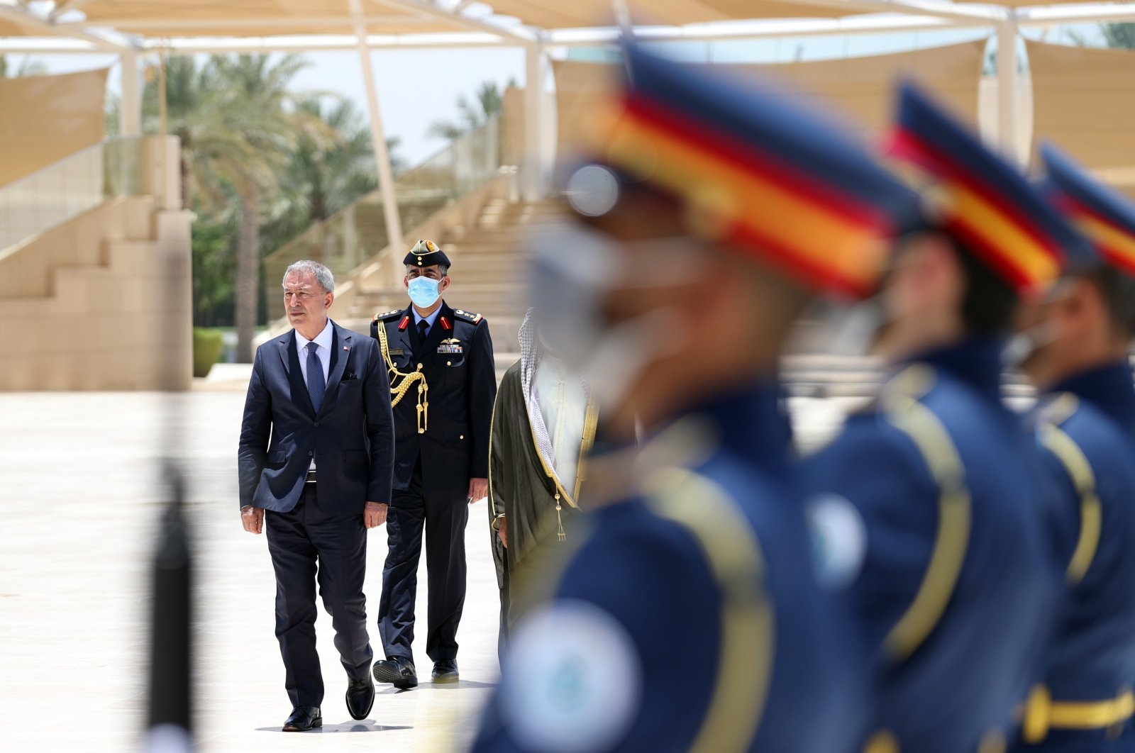 Defense Minister Hulusi Akar is welcomed by his UAE counterpart in a ceremony, May 30, 2022. (IHA Photo)