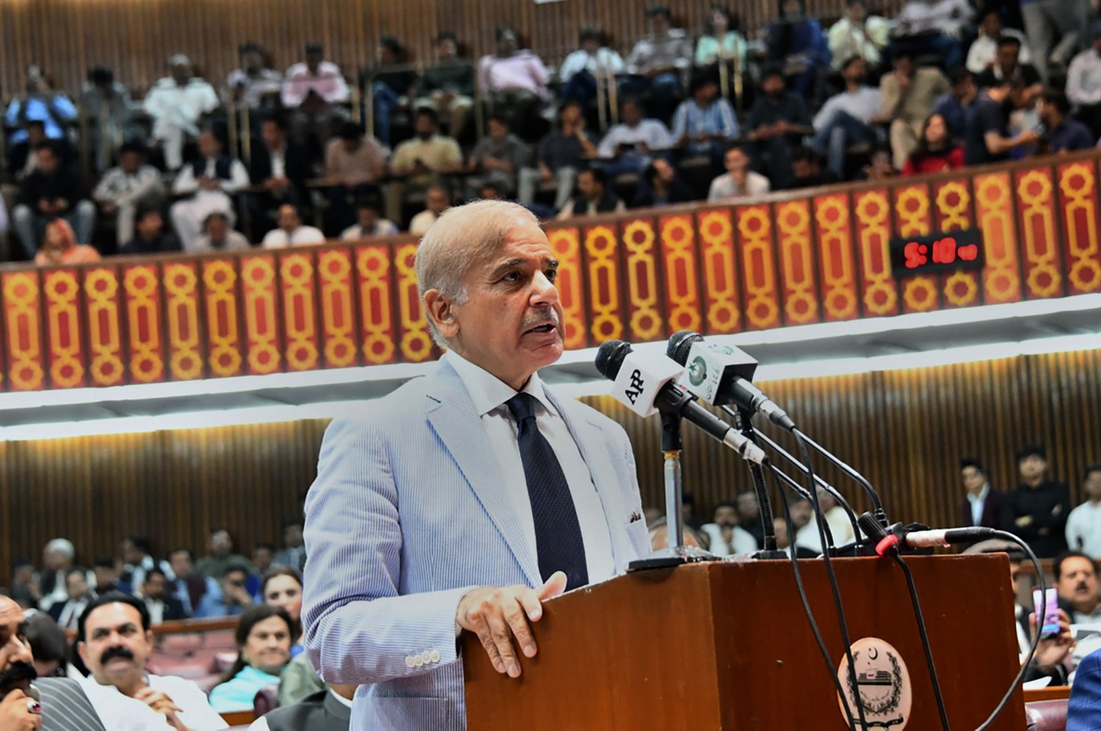 In this photo released by the National Assembly of Pakistan, newly elected Pakistani Prime Minister Shahbaz Sharif addresses a National Assembly session, in Islamabad, Pakistan, April 11, 2022. (National Assembly of Pakistan via AP)