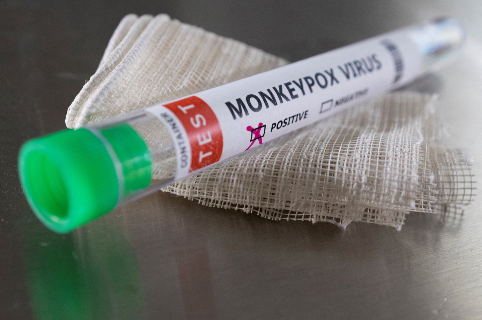 A test tube labeled &quot;Monkeypox virus positive&quot; is seen in this illustration taken May 22, 2022. (REUTERS Photo)