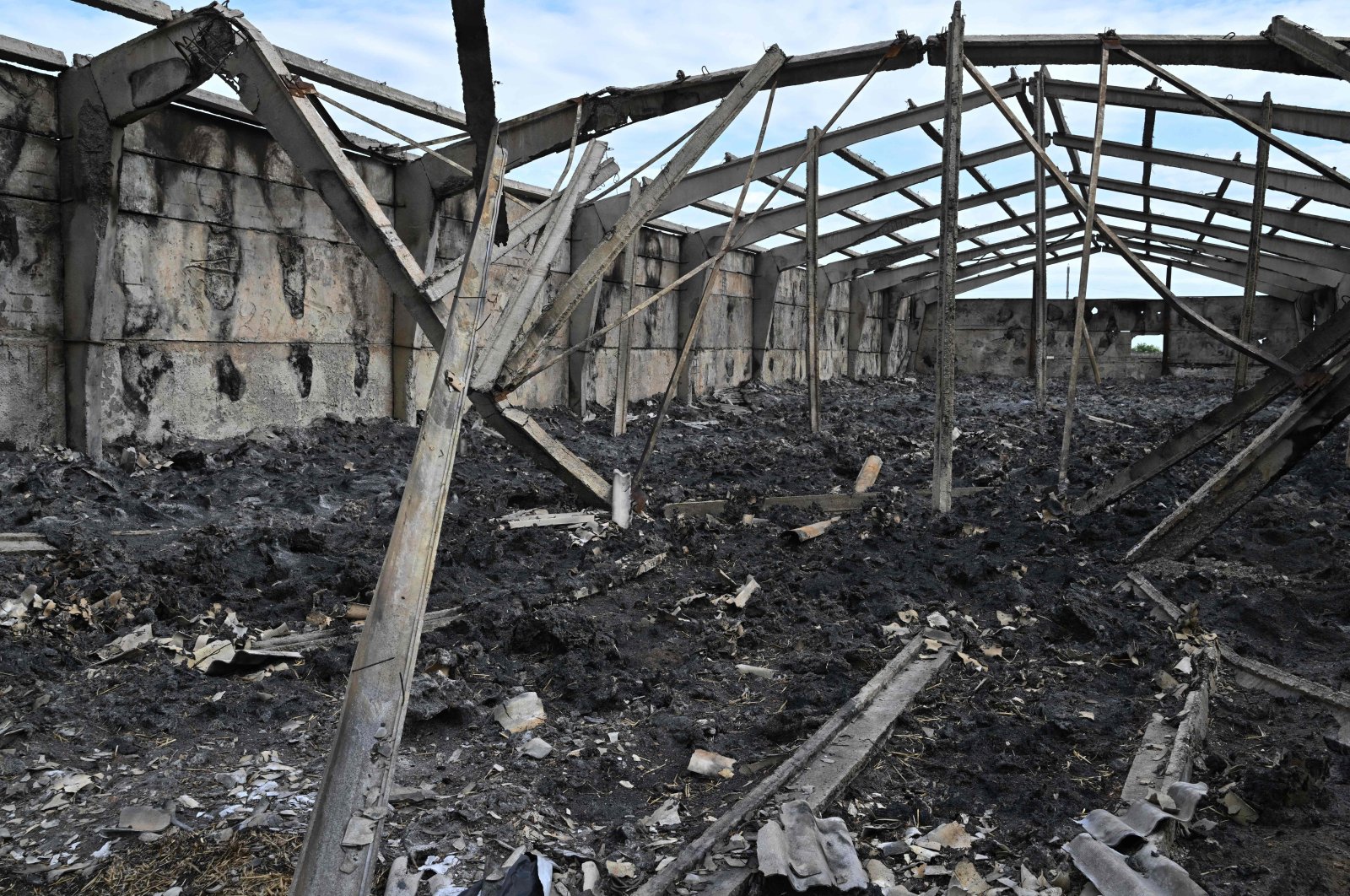 A warehouse destroyed in shelling in February is seen at a farm in the Odessa region, southern Ukraine, May 22, 2022. (AFP Photo)