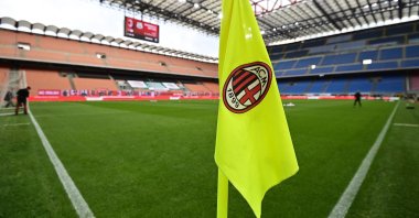 The AC Milan logo is pictured on a corner flag prior to an Italian Serie A football match at the San Siro stadium in Milan, Italy, April 21, 2021. (AFP Photo)