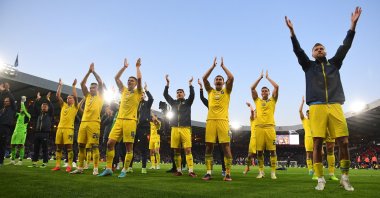 Ukraine's players applaud their fans after winning the FIFA World Cup 2022 playoff semifinal qualifier football match between Scotland and Ukraine at Hampden Park in Glasgow, Scotland on June 1, 2022. (AFP Photo)
