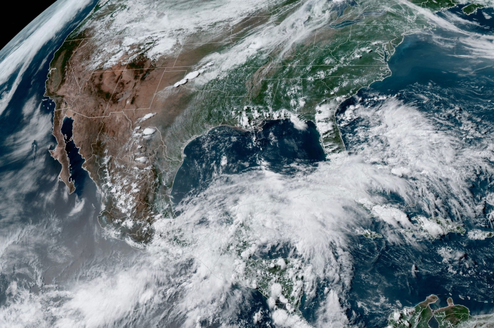 This RAMMB National Oceanic and Atmospheric Administration (NOAA) satellite handout image shows Hurricane Agatha over Mexico, May 31, 2022. (RAMMB/NOAA/NESDIS via AFP)