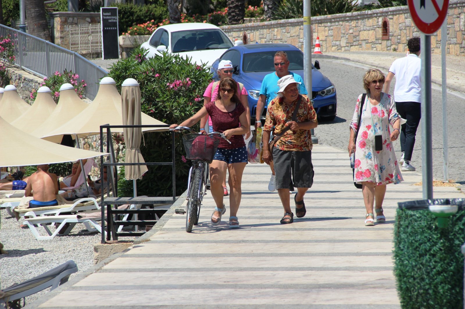 Tourists walk next to a beach in Bodrum, Muğla, southwestern Turkey, May 17, 2022. (IHA Photo)
