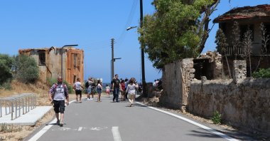 Tourists stroll around the streets of Varosha, Turkish Republic of Northern Cyprus, June 1, 2022. (AA Photo)