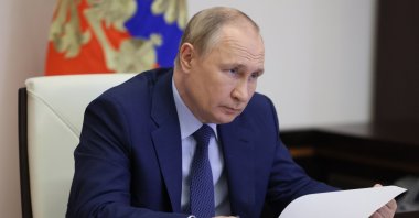 Russian President Vladimir Putin attends a meeting on the road construction development via videoconference at the Novo-Ogaryovo residence outside Moscow, Russia, Thursday, June 2, 2022. (Mikhail Metzel, Sputnik, Kremlin Pool Photo via AP)