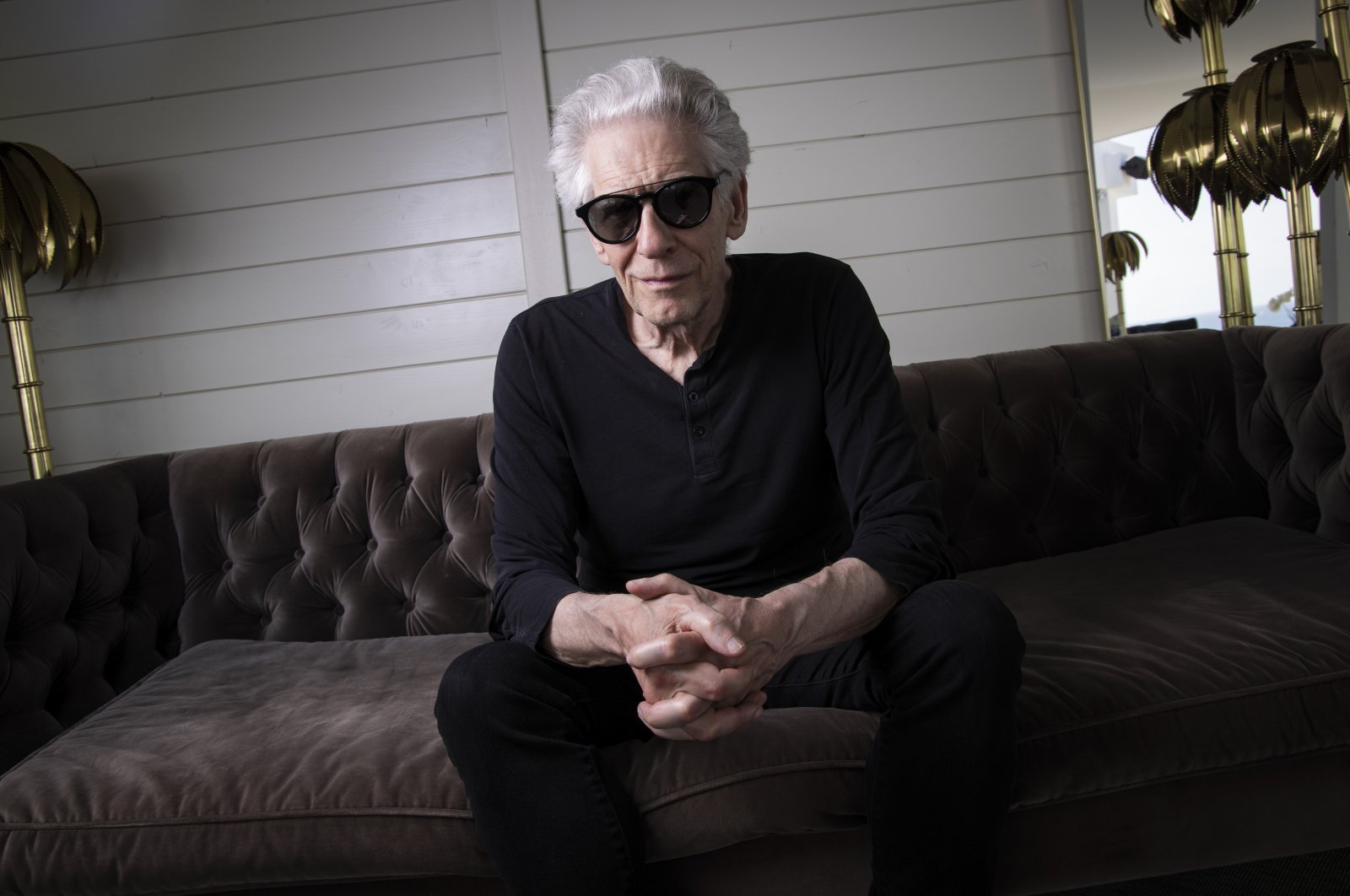 David Cronenberg poses for portrait photographs for the film &quot;Crimes of the Future,&quot; Cannes, southern France, Wednesday, May 25, 2022. (AP)