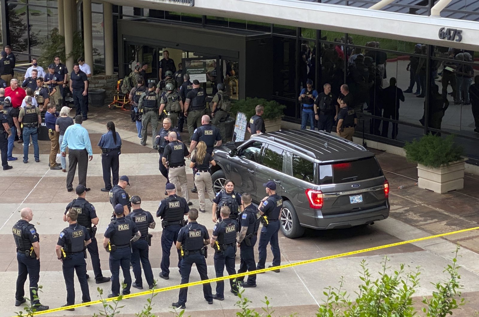 Emergency personnel respond to a shooting at the Natalie Medical Building in Tulsa, Oklahoma, U.S., June 1, 2022. (Tulsa World via AP)