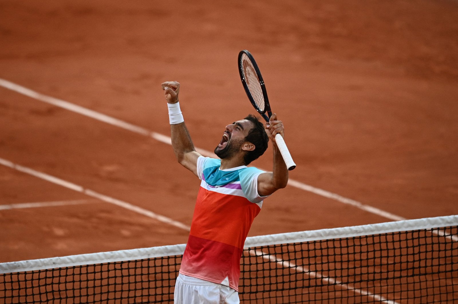 Croatia&#039;s Marin Cilic celebrates victory over Russia&#039;s Andrey Rublev in the French Open men&#039;s quarterfinal, Paris, France, June 1, 2022. (AFP Photo)