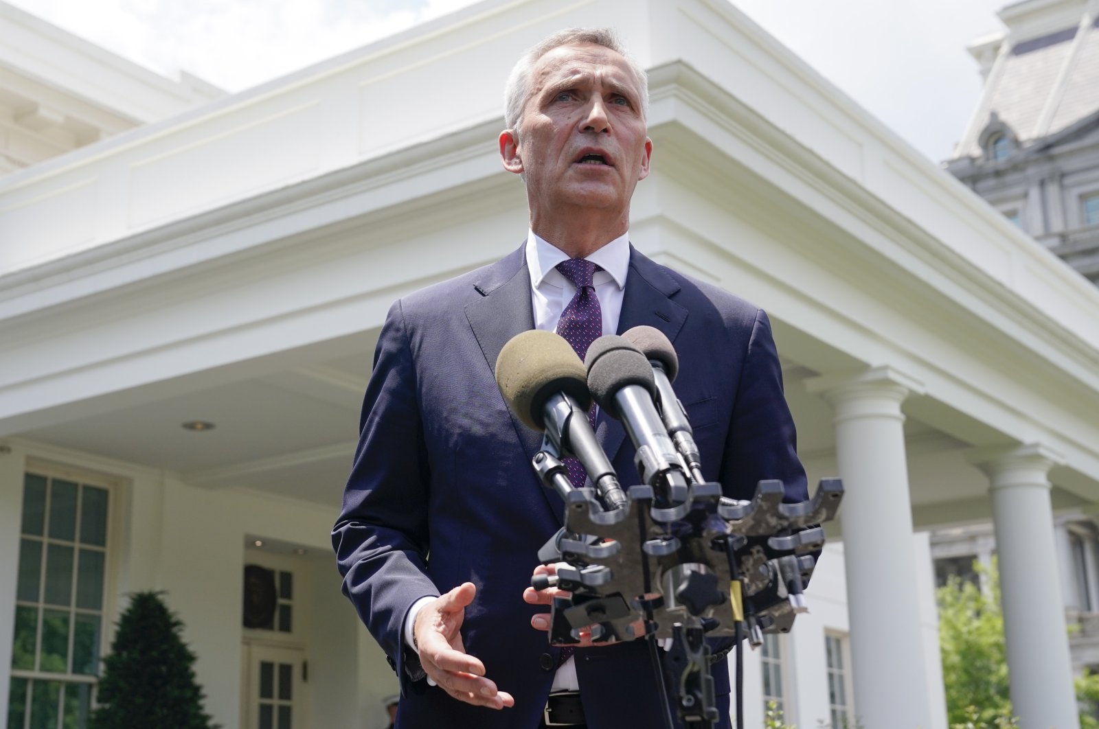NATO Secretary-General Jens Stoltenberg talks to reporters outside the White House after meeting with President Joe Biden, Thursday, June 2, 2022, in Washington. (AP Photo/Evan Vucci)