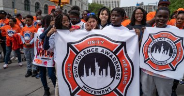 Dozens of people, including children, participate in a march and rally to denounce gun violence, New York City, U.S., June 2, 2022. (AFP Photo)
