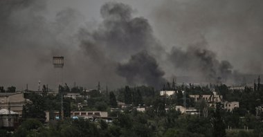 Smoke and dirt rise in the city of Severodonetsk during fighting between Ukrainian and Russian troops in the eastern region of Donbass, Ukraine, June 2, 2022. (AFP Photo)