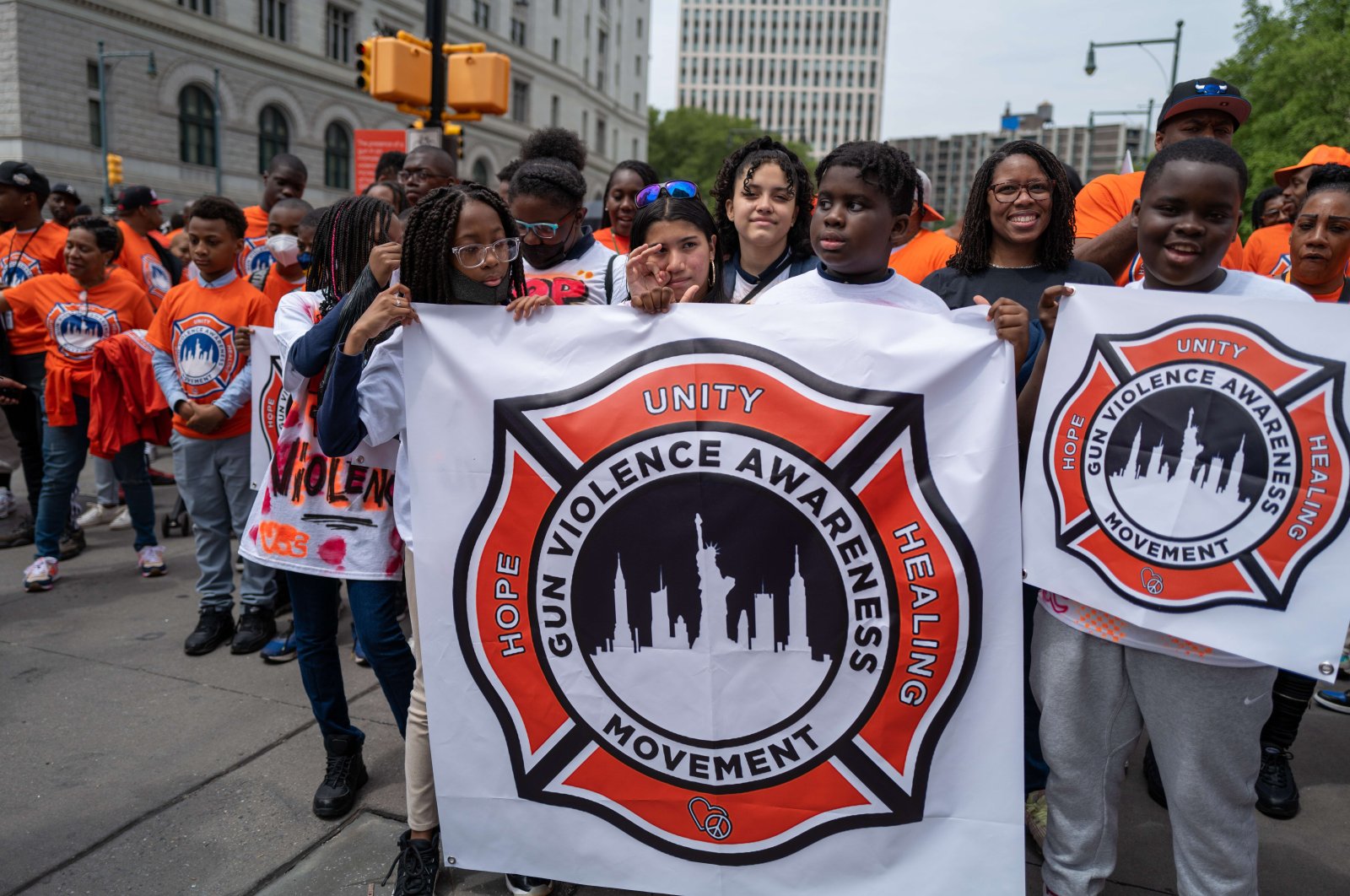 Dozens of people, including children, participate in a march and rally to denounce gun violence, New York City, U.S., June 2, 2022. (AFP Photo)