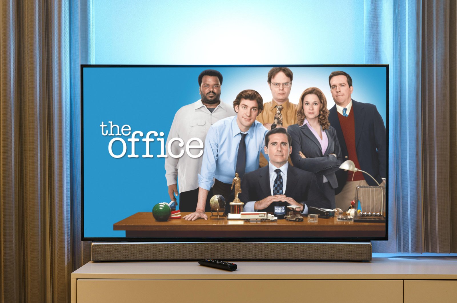 Several members of the cast from the popular American TV series "The Office" appear on a TV screen in this undated photo. (Alamy via Reuters)