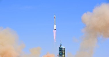 The Long March-2F carrier rocket, carrying the Shenzhou-14 spacecraft and three astronauts, takes off from Jiuquan Satellite Launch Center for a crewed mission to build China's space station, near Jiuquan, Gansu province, China June 5, 2022. (CNS photo via Reuters)