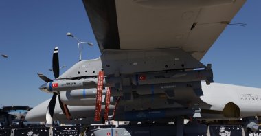 Laser-guided munition Bozok is seen integrated into Turkey's Akıncı unmanned combat aerial vehicle during the Teknofest aerospace and technology event, Baku Azerbaijan, May 28, 2022. (AA Photo)