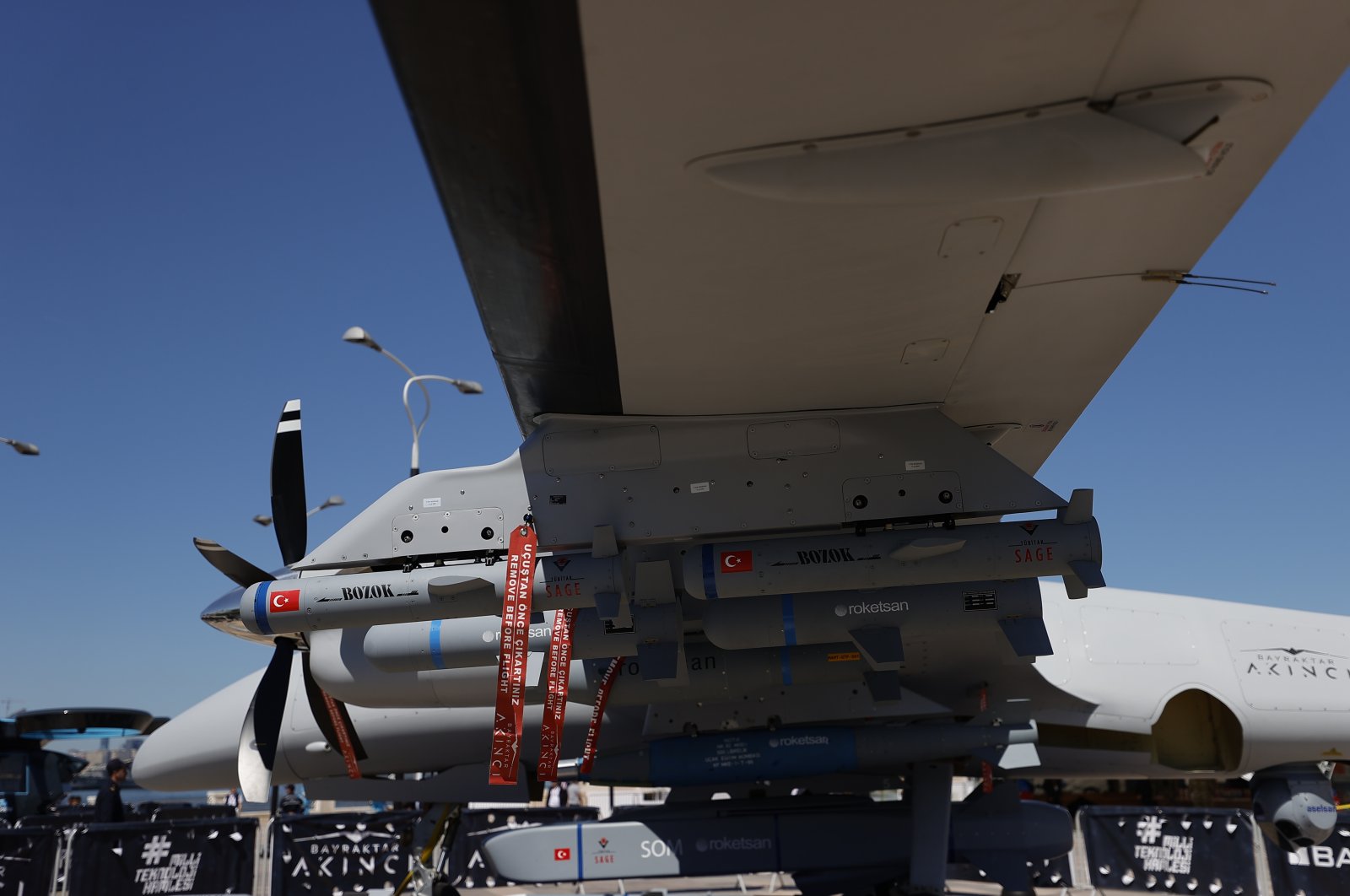 Laser-guided munition Bozok is seen integrated into Turkey&#039;s Akıncı unmanned combat aerial vehicle during the Teknofest aerospace and technology event, Baku Azerbaijan, May 28, 2022. (AA Photo)