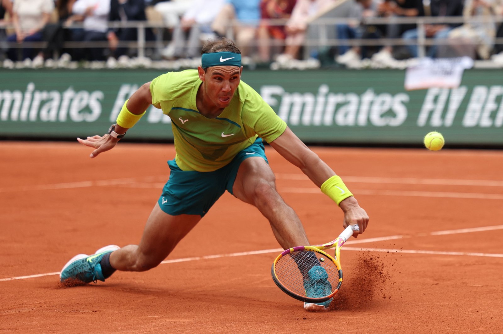 Spain&#039;s Rafael Nadal plays a forehand return to Norway&#039;s Casper Ruud during their men&#039;s singles final match on day fifteen of the Roland-Garros Open tennis tournament at the Court Philippe-Chatrier in Paris on June 5, 2022. (Photo by Thomas SAMSON / AFP)