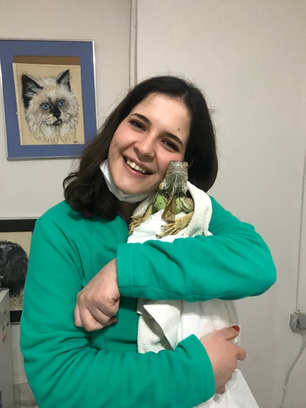 Merve Siirtli, a veterinarian at the exotic animal hospital, with an iguana patient, Istanbul, Turkey. (Photo courtesy of hospital)