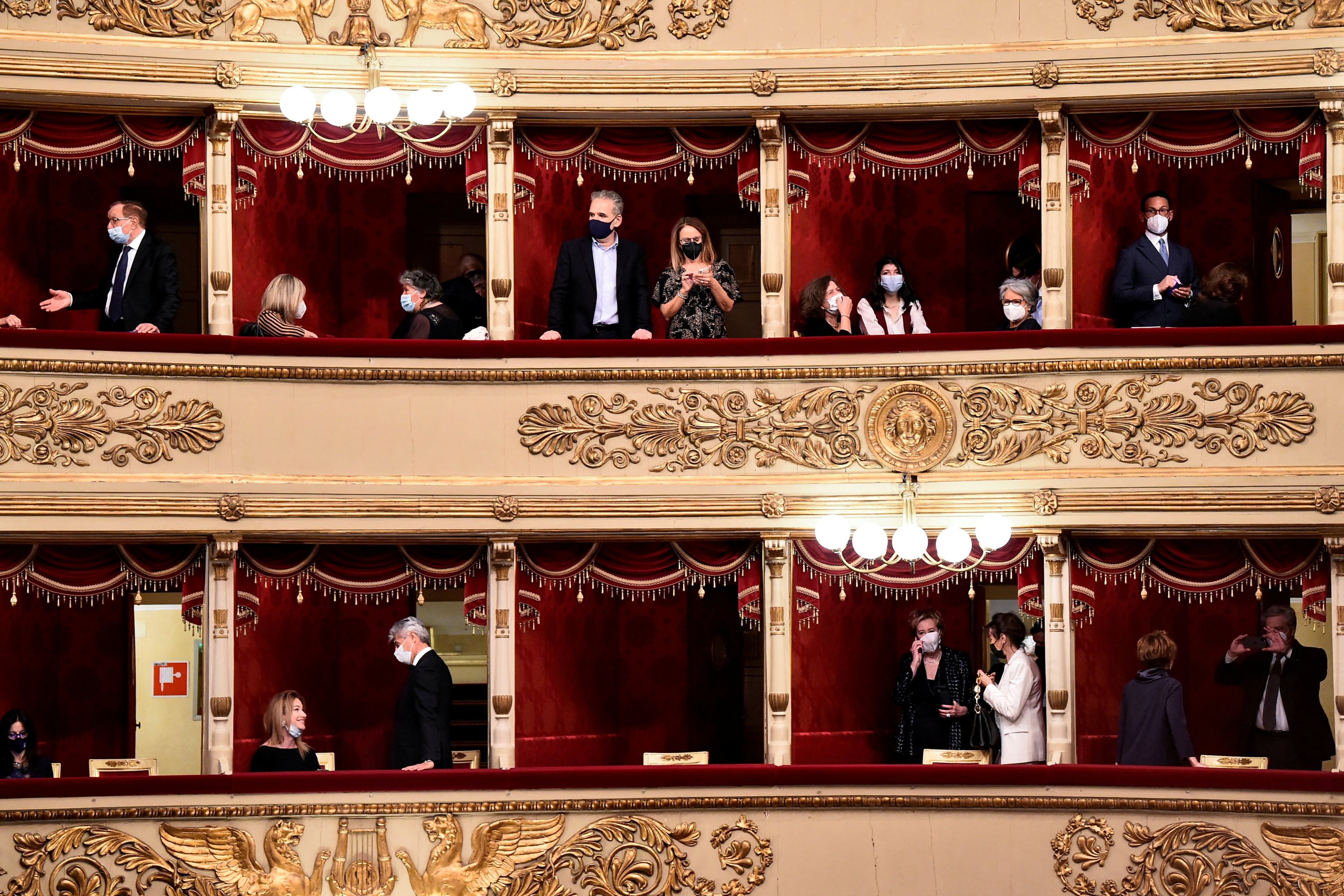People attend the reopening of La Scala opera house after it was closed due to the coronavirus pandemic, in Milan, Italy, May 10, 2021. (Reuters Photo)