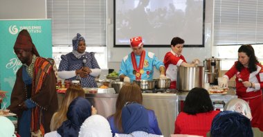 Members of the Yunus Emre Institute prepare traditional Turkish food, in Johannesburg, South Africa, May 16, 2022. (AA Photo)