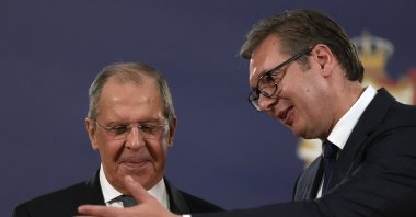 Russian Foreign Minister Sergey Lavrov (L) speaks with Serbia's President Aleksandar Vucic after a press conference in Belgrade, Serbia, Oct. 10, 2021. (AP Photo)