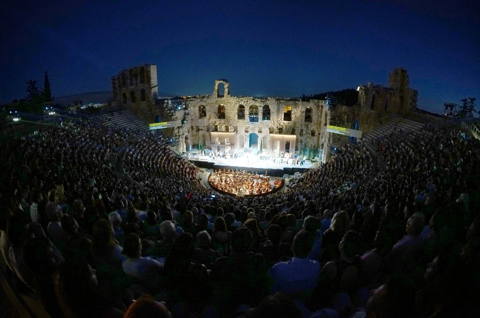 For the first time since the pandemic, thousands of opera enthusiasts were able to enjoy a performance at the ancient Herodion amphitheater below the Acropolis in Athens. (DPA)