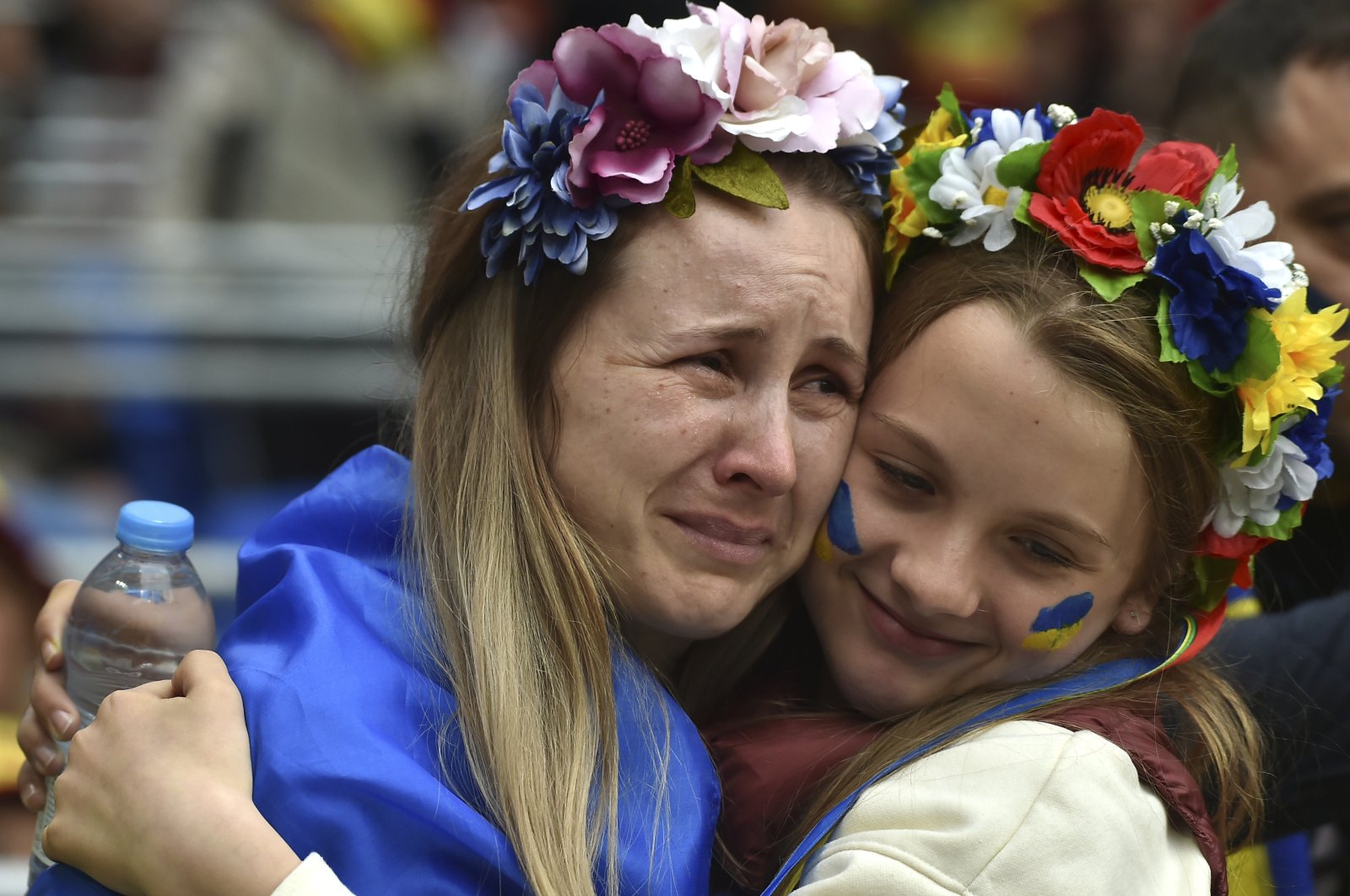 Ukraine fans react before the World Cup 2022 qualifying playoff against Wales, Cardiff, Wales, June 5, 2022. (AP Photo)