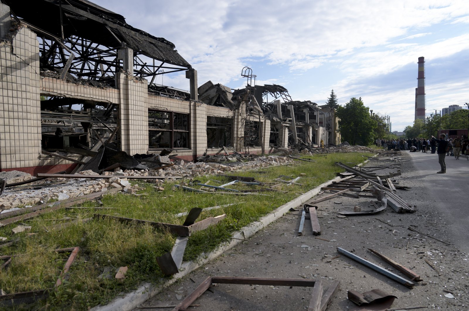 Wreckage lies along a street at a railway service facility hit by a Russian missile strike in Kyiv, Ukraine, June 5, 2022. (AP Photo)