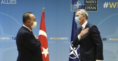 Foreign Minister Mevlüt Çavuşoğlu and NATO Secretary-General Jens Stoltenberg greet each other prior to their meeting, in Brussels, Belgium, Jan. 22, 2021. (AP)
