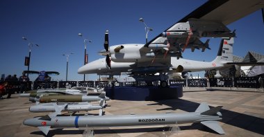 Air-to-air missiles Bozdoğan (bottom) is seen next to Turkey's Akıncı unmanned combat aerial vehicle during the Teknofest aerospace and technology event, Baku Azerbaijan, May 28, 2022. (AA Photo) 