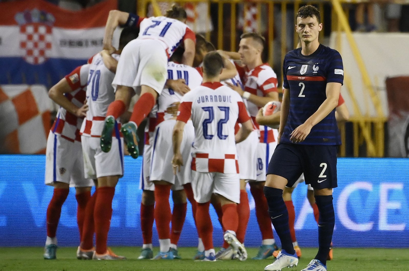 Croatia players celebrate a goal as France&#039;s Benjamin Pavard (R) reacts during a UEFA Nations League game, Split, Croatia, June 6, 2022. (AFP Photo)