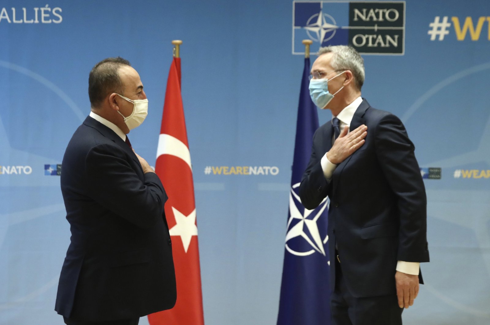 Foreign Minister Mevlüt Çavuşoğlu and NATO Secretary-General Jens Stoltenberg greet each other prior to their meeting, in Brussels, Belgium, Jan. 22, 2021. (AP)