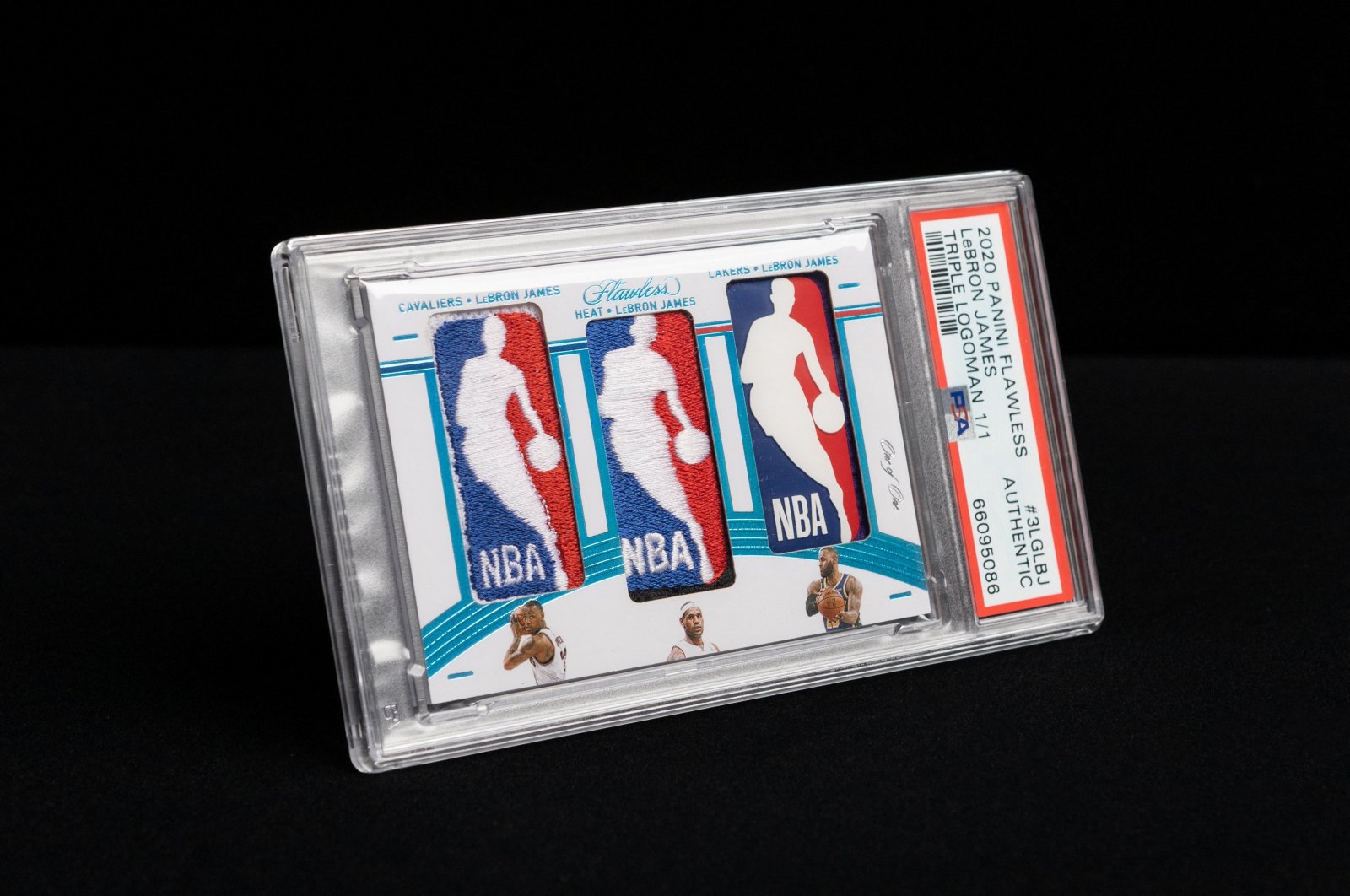 The "Triple Logoman" card, a single-issue card featuring the 18-time NBA All-Star LeBron James, including patches taken from jerseys he wore while with the Cleveland Cavaliers, Miami Heat and Los Angeles Lakers, is seen in this undated handout photo. (Reuters Photo)