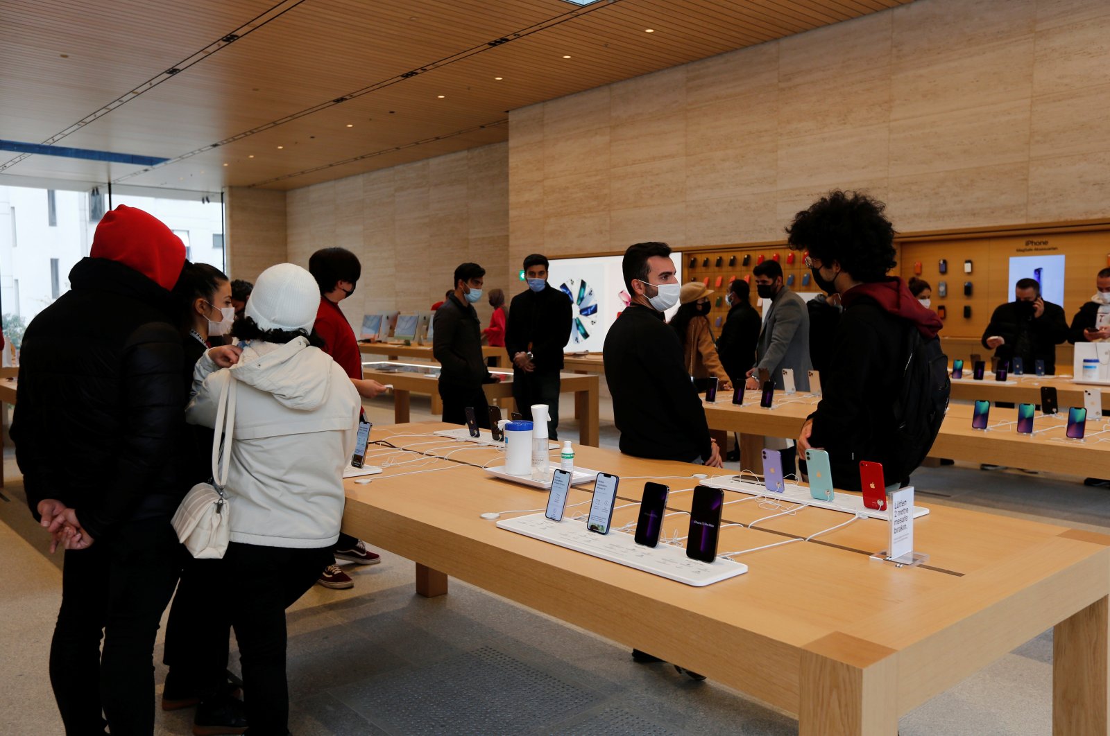 People check the products at an Apple store in Istanbul, Turkey, Nov. 24, 2021. (Reuters Photo)