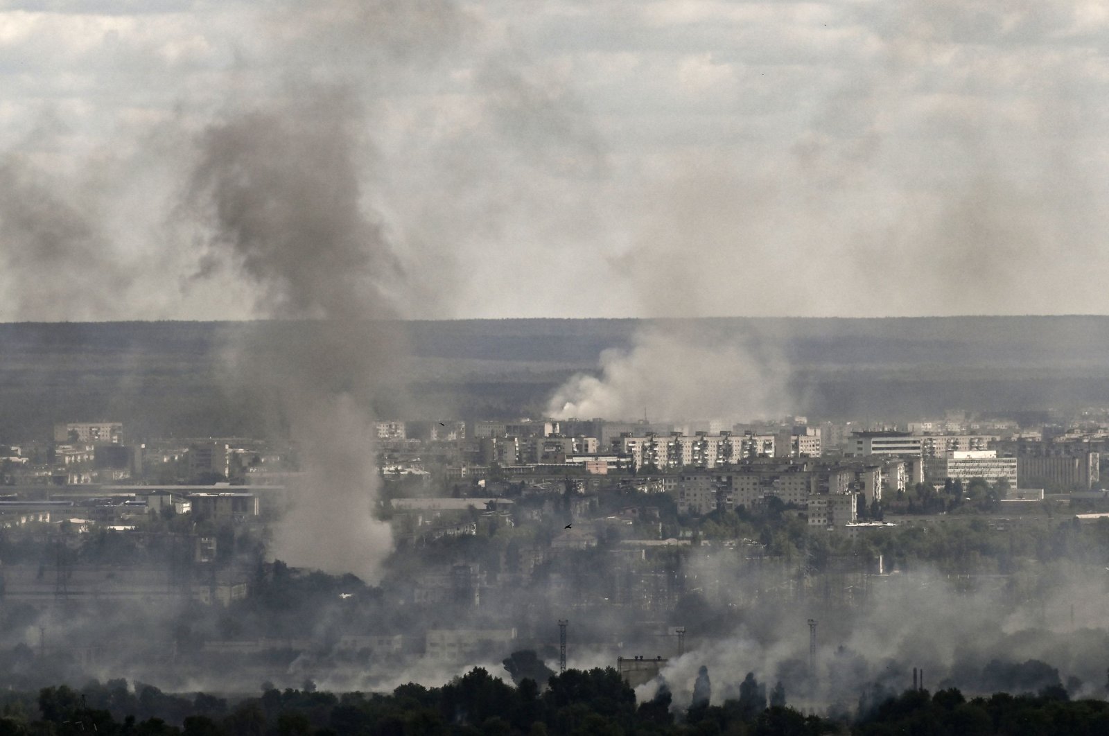 Smoke and dirt rise from shelling in the city of Severodonetsk during fight between Ukrainian and Russian troops in Donbass, Russia, June 7, 2022. (AFP Photo)