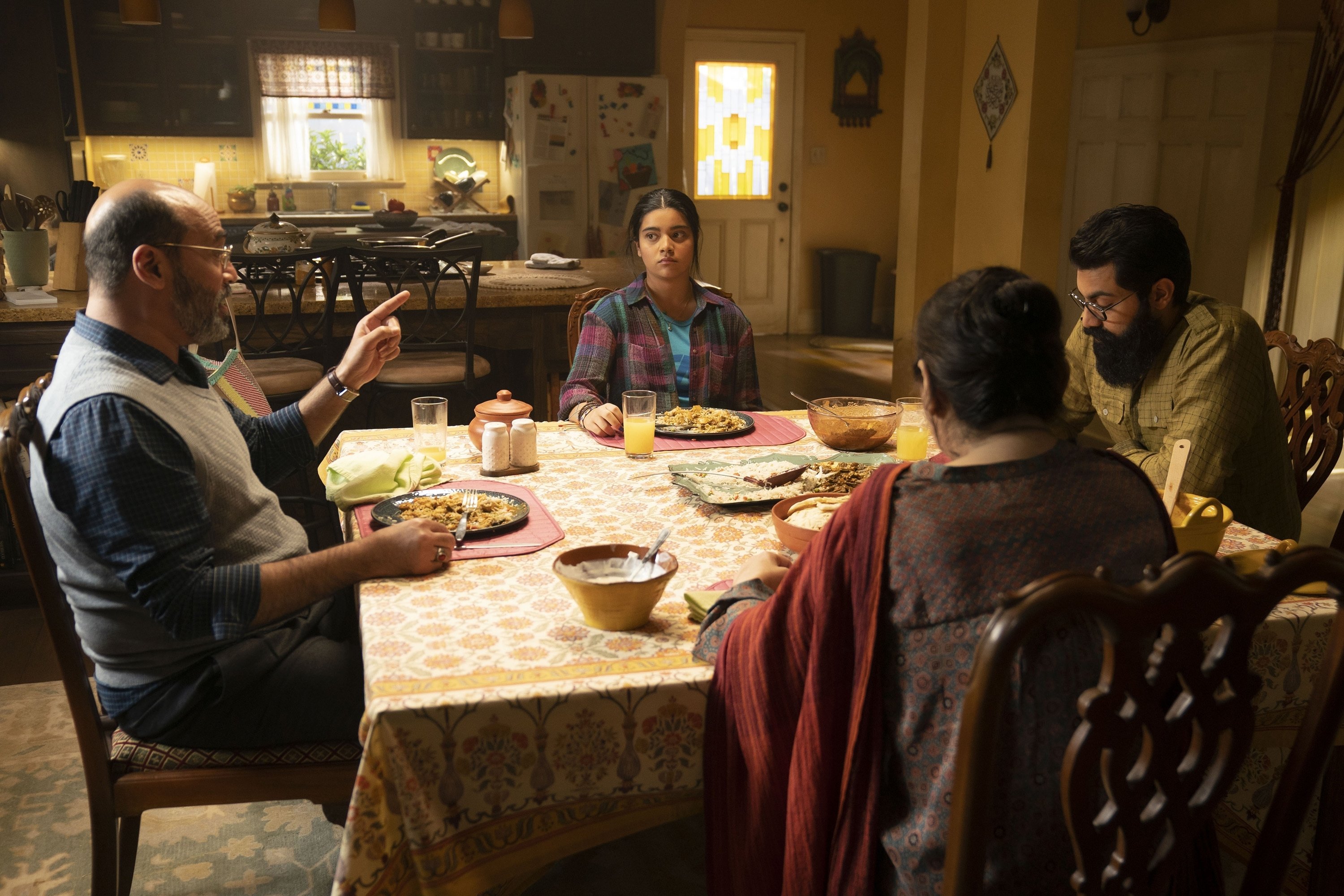 This image released by Disney shows, from left, Mohan Kapur, Iman Vellani, Nimra Bucha and Saagar Shaikh in a scene from the series 