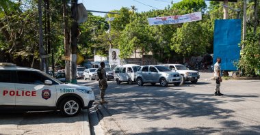 Haitian police officers carry out street checks after kidnappings, in Port-au-Prince, Haiti, May 9, 2022. (EPA PHOTO) 