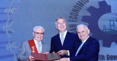 Montenegro's President Milo Dukanovic (C) is seen during a visit to an economic summit in Istanbul, Turkey, June 7, 2022. (AA Photo)