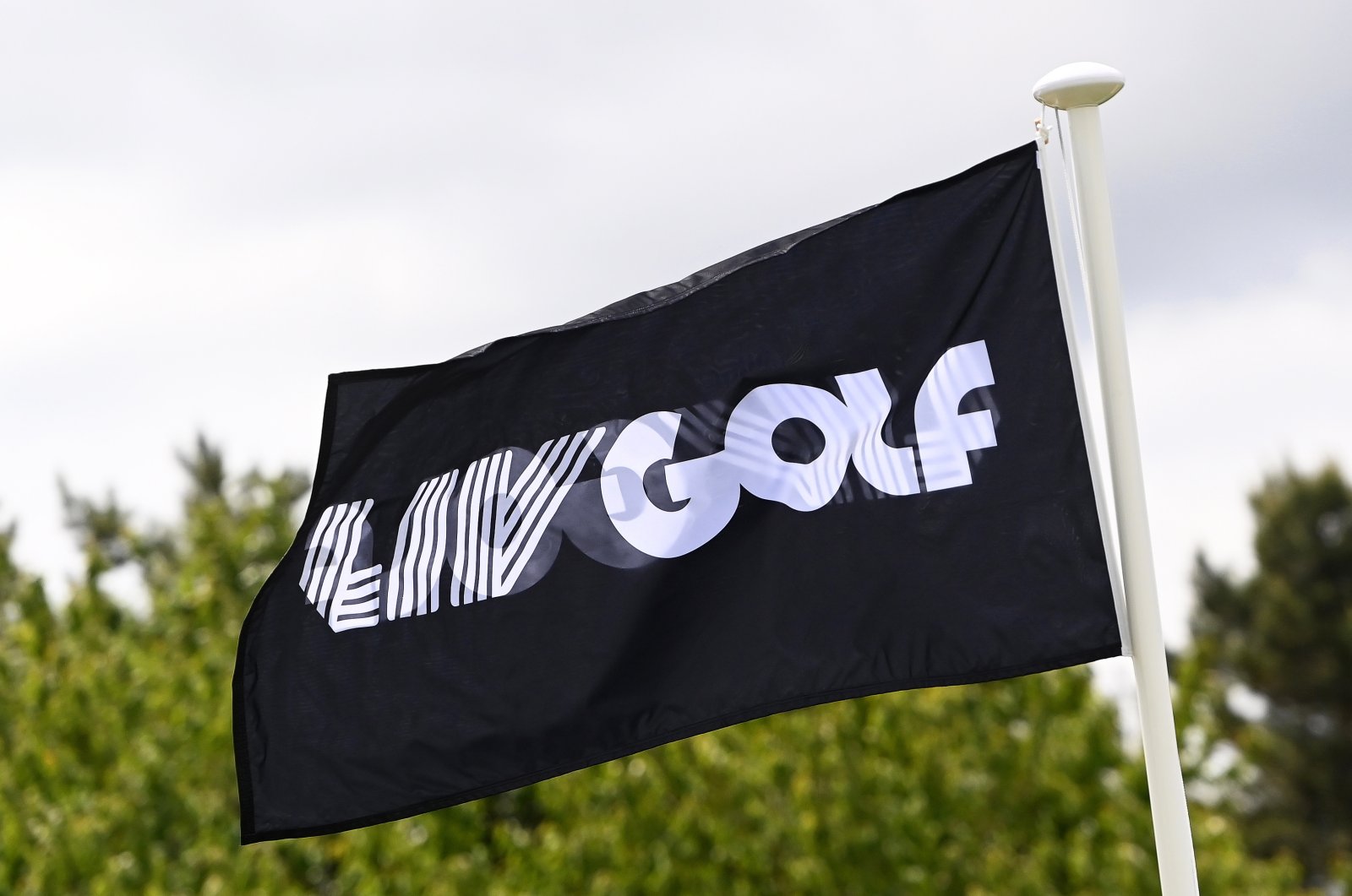 The LIV Golf logo on a flag during the LIV Golf Invitational Series, St. Albans, England, June 8, 2022. (EPA Photo)