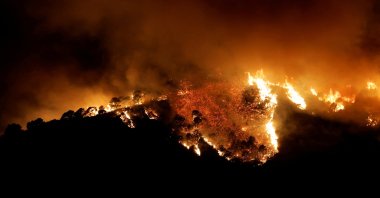 A forest fire is seen in Benahavis, Spain, June 8, 2022. (Reuters Photo)
