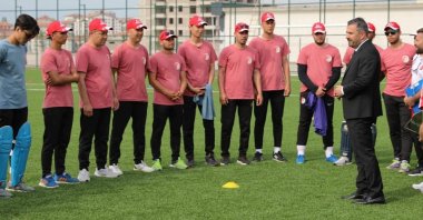 Pursaklar Mayor Ertuğrul Çetin (R) meets members of the Turkey national men's cricket team, Ankara, Turkey, June 9, 2022. (IHA Photo)