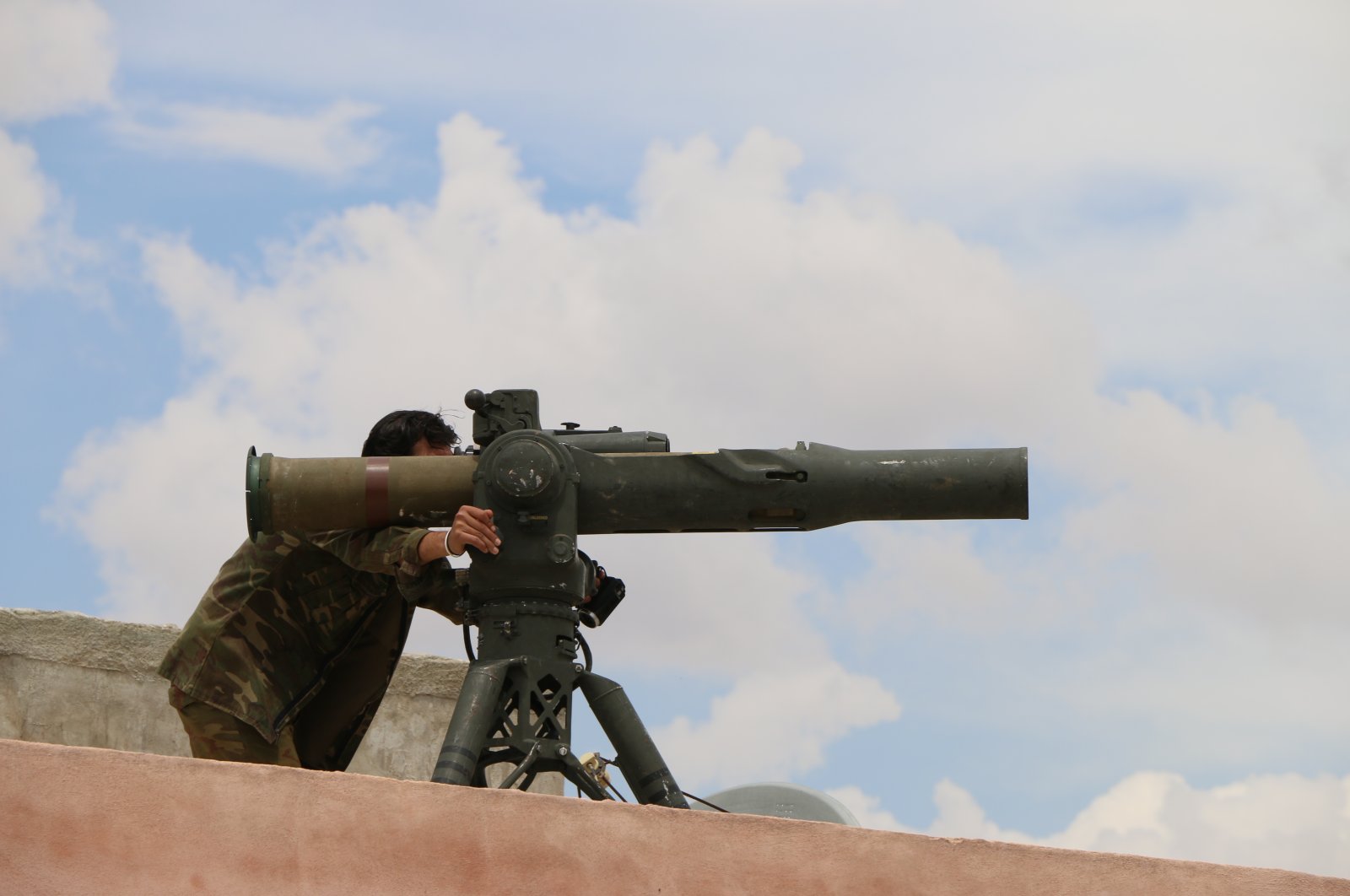YPG terrorists using U.S.-made TOW missiles, in Manbij, Syria (AA Photo) 