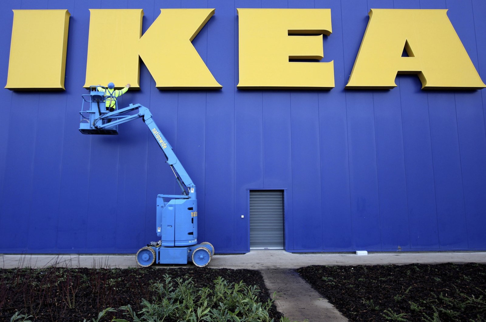 Site Foreman David Smyth at work on the New IKEA store in Belfast, Northern Ireland, Dec. 11, 2007. (AP Photo)