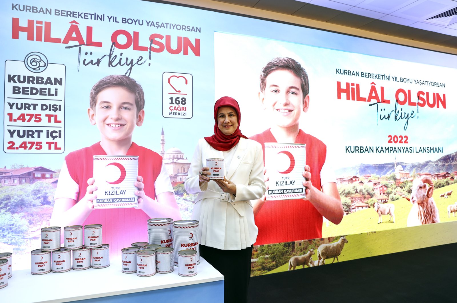 Turkish Red Crescent Deputy Director, Professor Fatma Meriç Yılmaz, shows the cans of meat that will be delivered in the campaign, in Istanbul, Turkey, June 9, 2022.