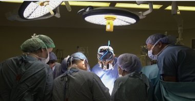 Turkish doctors operating on the conjoined twins in a successful 9-hour surgery, Acıbadem Hospital, Istanbul, Turkey, June 10, 2022. (DHA Photo)