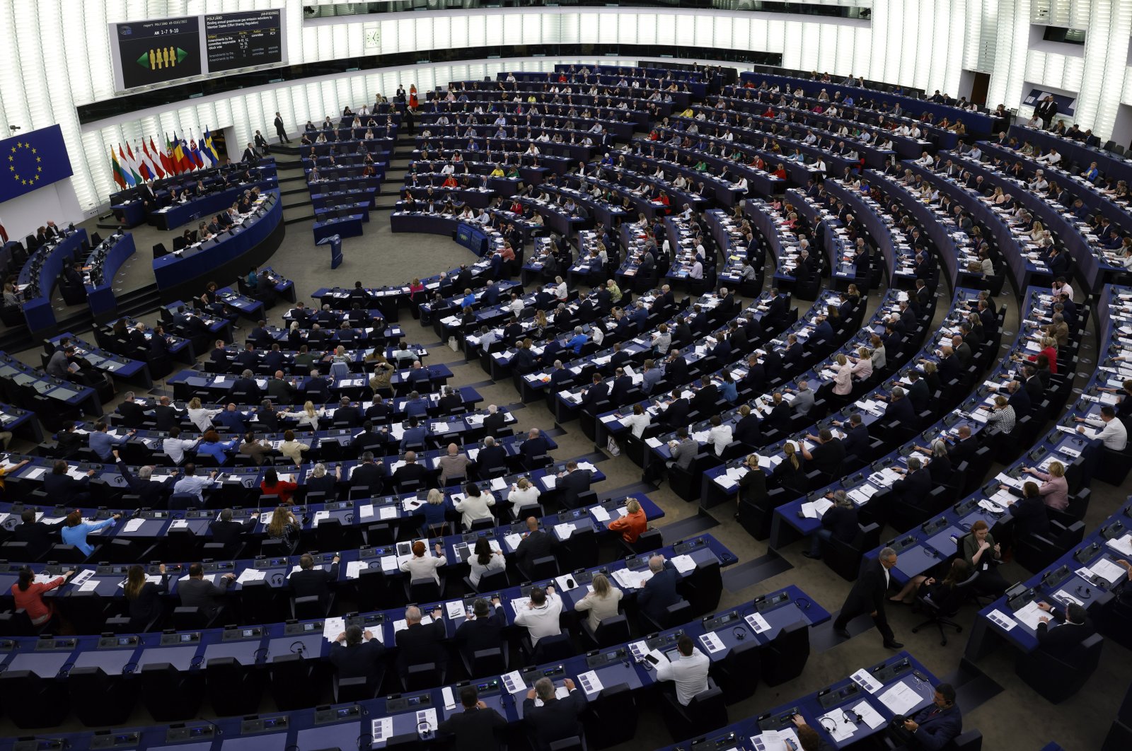 Members of Parliament vote on plans to reduce carbon emissions, at the European Parliament, in Strasbourg, eastern France, June 8, 2022. (AP Photo)