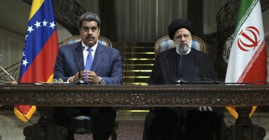 Iranian President Ebrahim Raisi (R) speaks in a joint news briefing with his Venezuelan counterpart Nicolas Maduro at the Saadabad Palace in Tehran, Iran, June 11, 2022. (AP Photo)