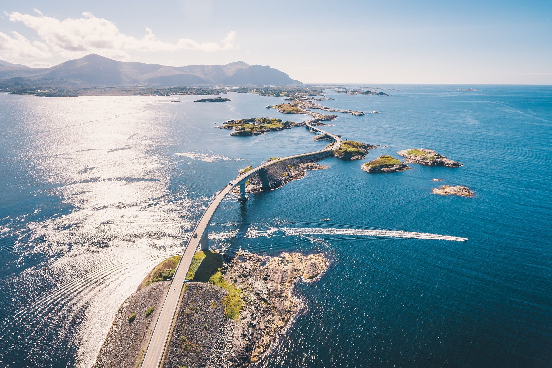 The Atlantic Ocean Road in Norway is built on several small islands and skerries, which are connected by several causeways, viaducts and eight bridges. (Shutterstock Photo)