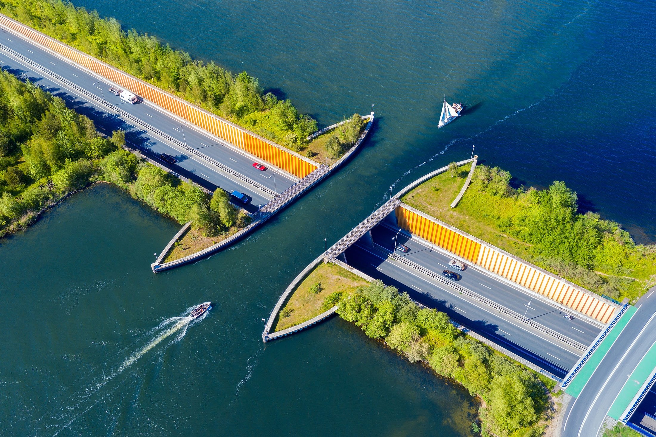 Veluwemeer Aqueduct is a long navigable aqueduct, located over Veluwemeer lake in Harderwijk, Netherlands. (Shutterstock Photo)